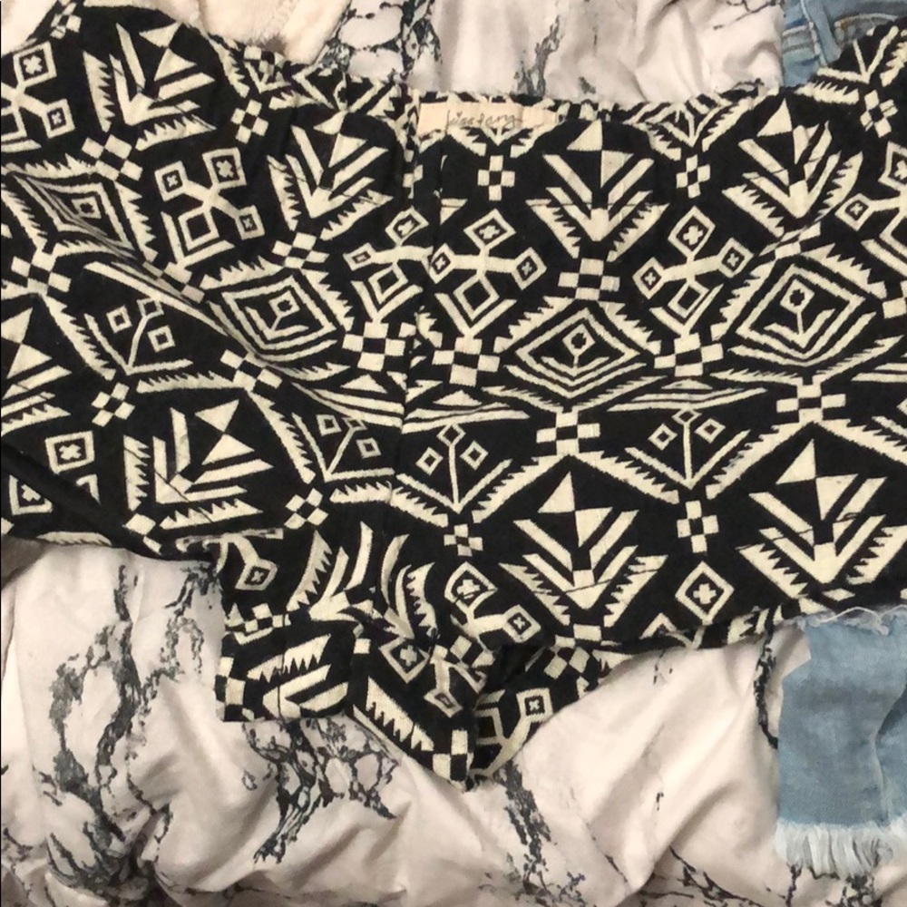 2 pairs of shorts with tribal print.
